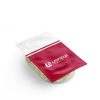 Flexible thermoforming package with a red and white Layfield label sealed over a clear tray containing food.