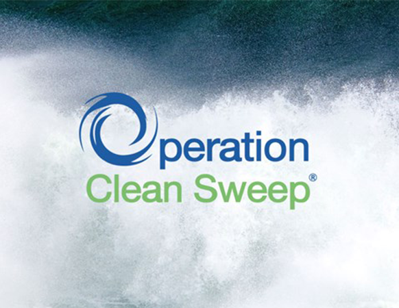 Operation Clean Sweep logo with ocean wave background