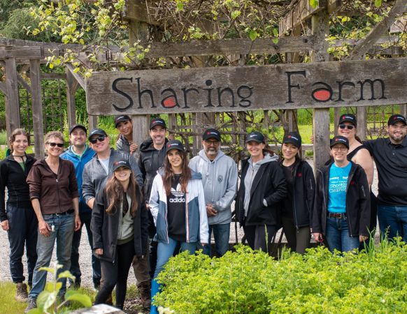 Group of Layfield Flexible Films employees volunteering at The Sharing Farm in Richmond, BC